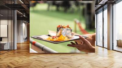 client buying mexican street fast food with tacos from vendor in food truck Wall mural