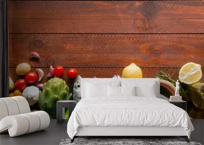 Fresh organic food - natural sea fish and veggies on the wooden surface Wall mural