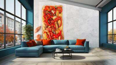 Spanish coca with onion and bell pepper on a gray concrete background Wall mural