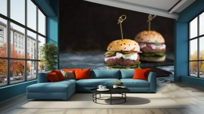 Veggie falafel burgers with fresh vegetables on dark background Wall mural