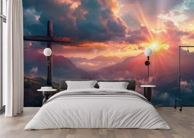 Cross of Jesus. Easter, resurrection concept. Christian wooden cross on a background with dramatic lighting, colorful mountain sunset, dark clouds and sky, sunbeams Wall mural