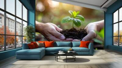 Sustainability Partners Trust mission of ecosystem plant business holds green plants together symbolizing green business company with development ecology concept. Wall mural