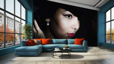 portrait of vintage woman in classic hat and pearls jewelry, retro styling girl Wall mural