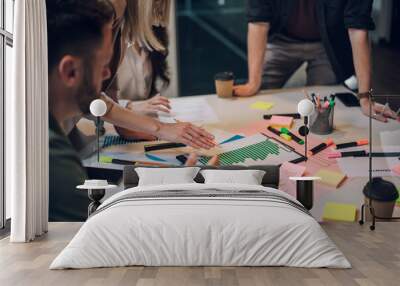 Group of business people having a meeting in the office Wall mural