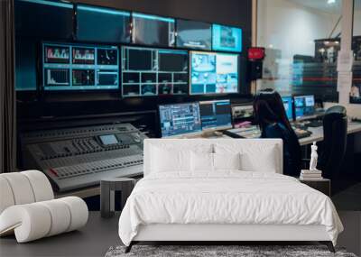 Middle aged woman using equipment in control room on a tv station Wall mural