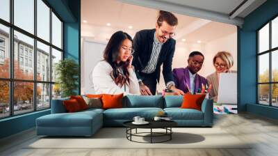 Multiracial business group of people having a meeting in an office Wall mural