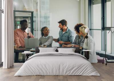 Multiracial business team having a meeting in an office Wall mural