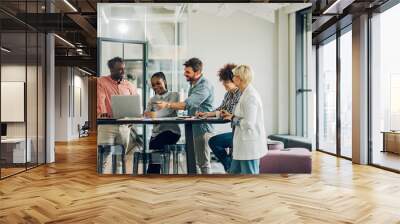 Multiracial business team having a meeting in an office Wall mural