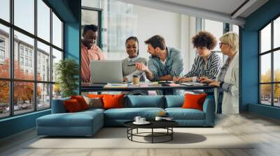 Multiracial business team having a meeting in an office Wall mural