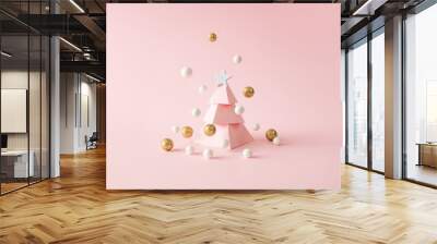 Christmas composition. Pink Christmas tree, with decoration on pink background. Happy holidays. new year minimal concept. Wall mural