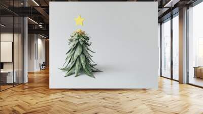 Christmas tree made of pineapple leaves and christmas decoration. Holiday concept. Wall mural