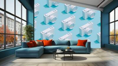 Pattern composition of vintage cameras on pastel blue background. Minimalist isometric concept. Wall mural