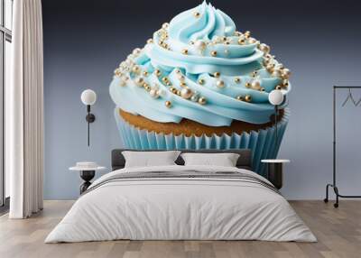 delicious Christmas cupcake with blue cream and new year sprinkles, isolated on light background Wall mural