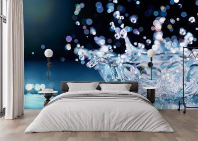 Droplets collide with a surface, sending shimmering water splashes into the air. The captivating interplay of light and water creates a magical atmosphere, highlighting natural beauty Wall mural