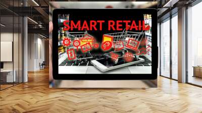 Data Management Platform marketing crm and smart retail concept. Infographic and texts with tablet and two shopping carts on smart phone laptop in retail shop background Wall mural