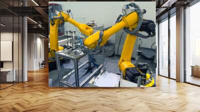 Manufacturing production industrial machine , factory robots arm in smart factory and industry 4.0 concept. Wall mural