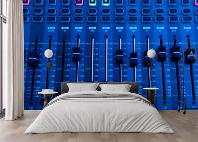 Professional audio studio sound mixer console board panel with recording , faders and adjusting knobs,TV equipment. Blue tone and close-up image. Wall mural