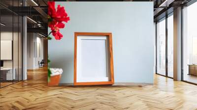 Blank picture frame mockup in modern interior with plant. 3d render Wall mural