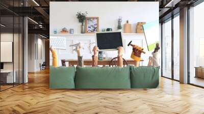 Children are holding books, toys, and a keyboard. Educational concept	
 Wall mural