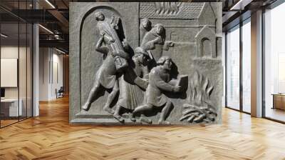 Ittingen Monastery in Frauenfeld is stormed and set on fire in July 1524., relief on the door of the Grossmunster (