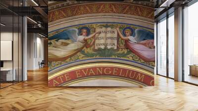 Two Angels Supporting the Book of the Gospels by Romain Cazes, the arch above the altar in the St Francis Xavier's Church in Paris, France  Wall mural