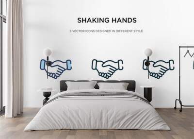 shaking hands icon in different style vector illustration. two colored and black shaking hands vector icons designed in filled, outline, line and stroke style can be used for web, mobile, ui Wall mural