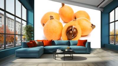 Close up view of some loquat fruit isolated on a white background Wall mural