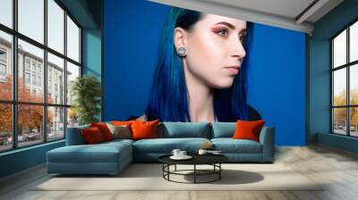 dramatic portrait attractive girl with blue hair Wall mural