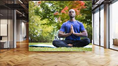 young man exercising yoga Wall mural