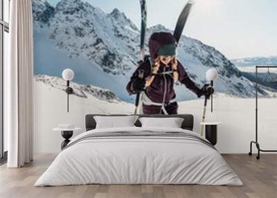 Mountaineer backcountry ski walking ski alpinist in the mountains. Ski touring in alpine landscape with snowy trees. Adventure winter sport. High tatras, Slovakia Wall mural