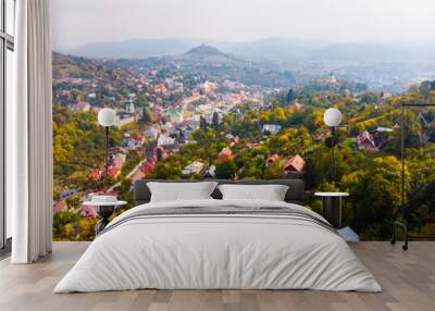 Sun set in old town with historical cityspace buildings in Banska Stiavnica, Slovakia, UNESCO. Calvary and new castle Wall mural