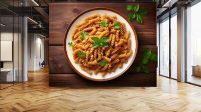 vegan pasta in plate on wooden background Wall mural