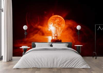 Abstract dark background with creative artwork decoration of glowing bulbs. Wall mural