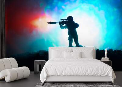 Army sniper with large-caliber sniper rifle seeking killing enemy. Silhouette on sky background. National security ensured, servicemen on guard Wall mural