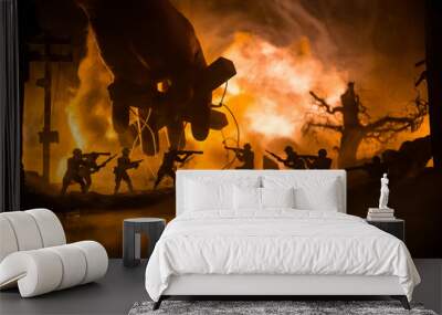 Concept of control. Marionette in human hand. Image on white. Night battle scene. Military fighting silhouettes in destroyed city. Selective focus Wall mural