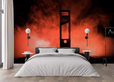 horror view of guillotine. close-up of a guillotine on a dark foggy background. Wall mural