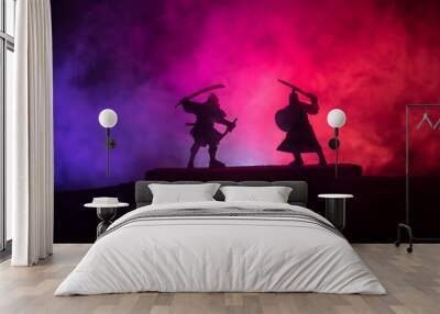 Silhouette of two samurais in duel. Picture with two samurais and sunset sky Wall mural