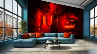 Two glasses of wine and bottle with Halloween - old jack-o-lantern on dark toned foggy background. Scary Halloween pumpkin. Useful as party poster Wall mural