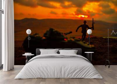 War Concept. Military silhouettes fighting scene on war fog sky background, World War Soldiers Silhouettes Below Cloudy Skyline at sunset. Attack scene. Armored vehicles. German tank in action Wall mural