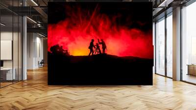 War Concept. Military silhouettes fighting scene on war fog sky background, Wall mural