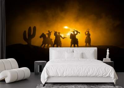 Western cowboy silhouette with texture at sunset and slivers of light Wall mural