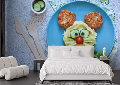 Funny little mouse for kids lunch. Food for children: mashed potatoes, burger, salad. Wall mural