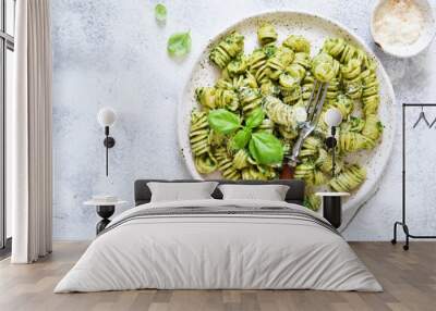 Vegan pasta with spinach, basil and parmesan. Lunch on the kitchen table. Wall mural