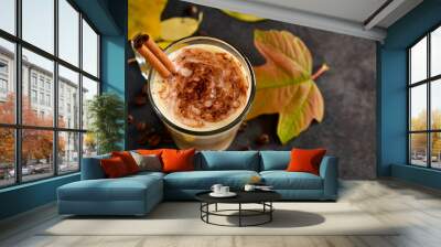 Warm, spicy drink - latte with cinnamon and pumpkin  Wall mural