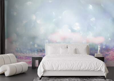 Abstract bright glitter lights colorful bokeh background in pastel blue pink and purple color Wall mural