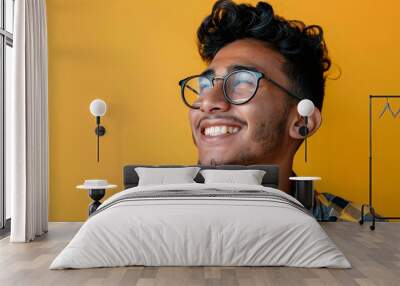 Exuberant Hispanic Man with Stylish Glasses: A Portrait of Excitement and Success Wall mural