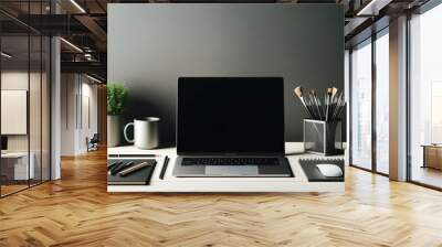 A neatly organized home office desk with a laptop, plant, and stationery, embodying a clean and modern work environment. Wall mural