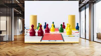 parcheesi game set upon board with white background Wall mural