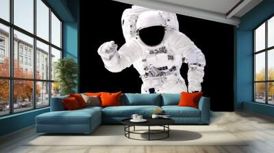 Astronaut in spacesuit close up isolated on black background. Spaceman in outer space. Elements of this image furnished by NASA Wall mural