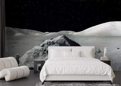 Astronaut landed on the planet. Cosmonaut goes to his moon rover. Outer space planet landscape . Elements of this image furnished by NASA  Wall mural